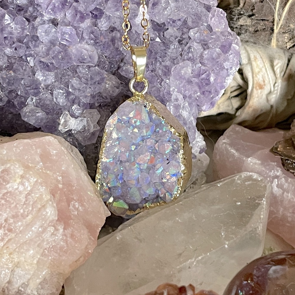 Gold toned crystal pendant